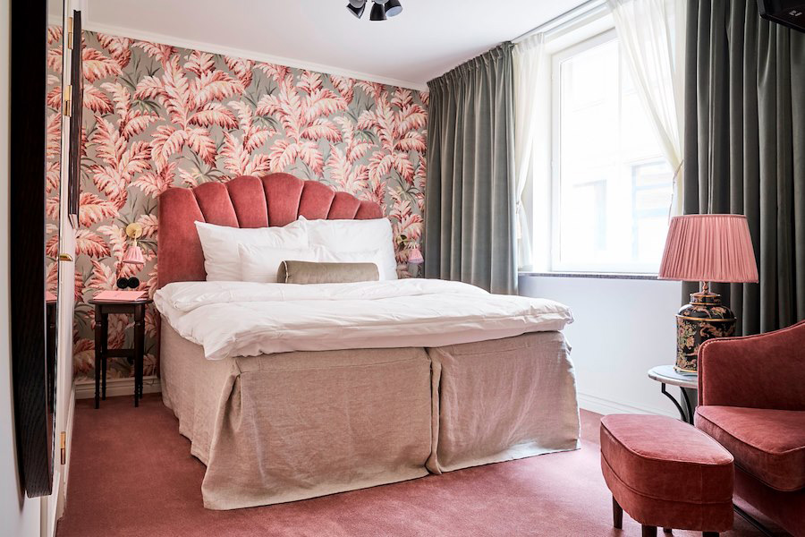 Small boutique hotel room with double bed at MJ'S in Malmö